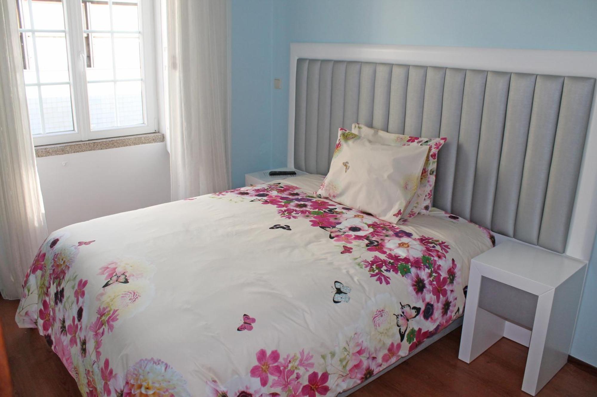 Tweepersoonskamer met 1 of 2 Bedden en Gedeelde Badkamer
