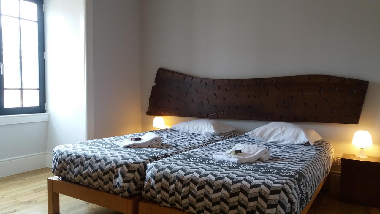Quarto Twin com Casa de Banho Partilhada